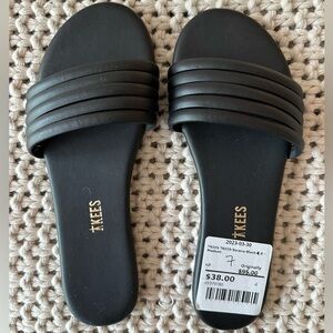 Tkee slide sandals